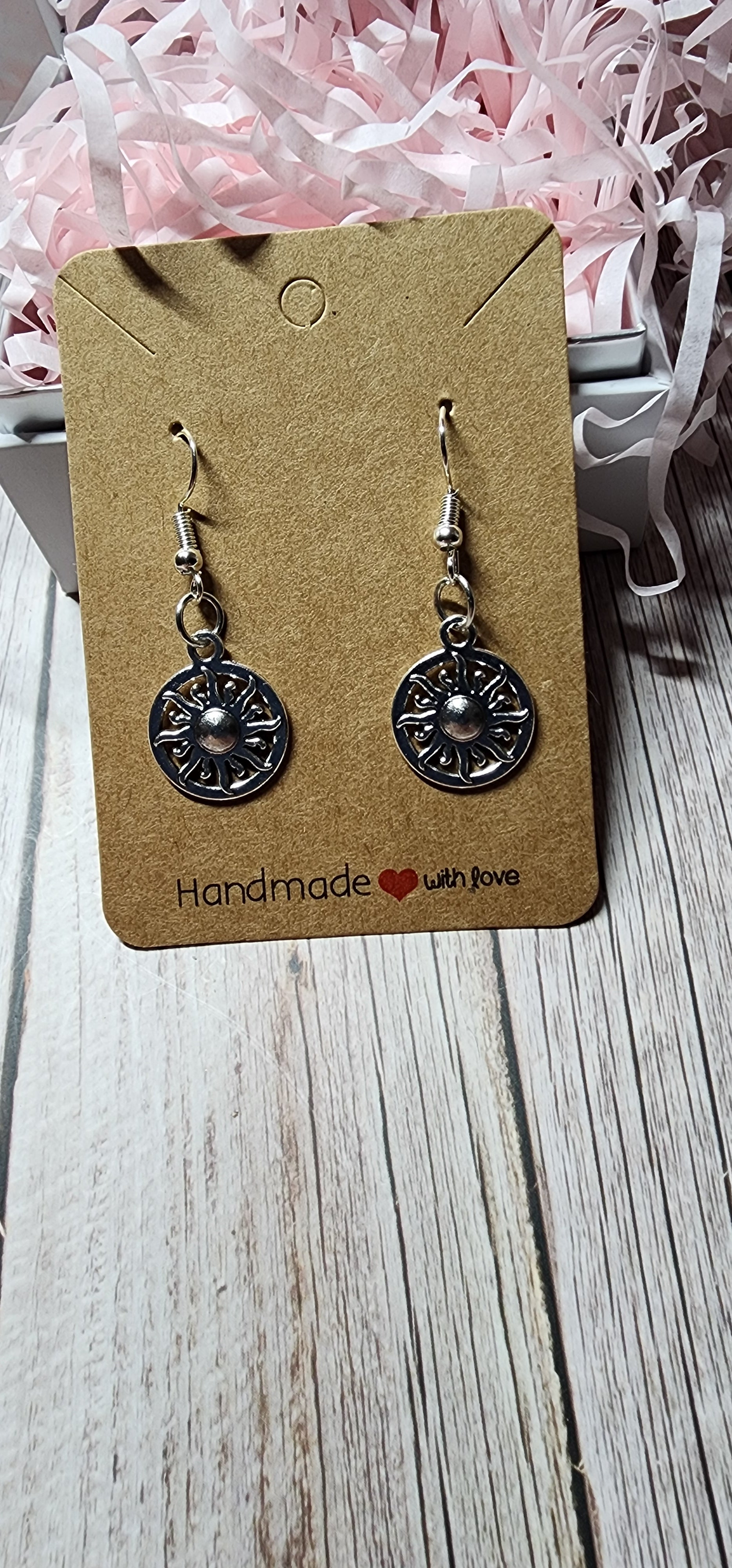 Boho style silver celestial dangle earrings sun moon and star charms