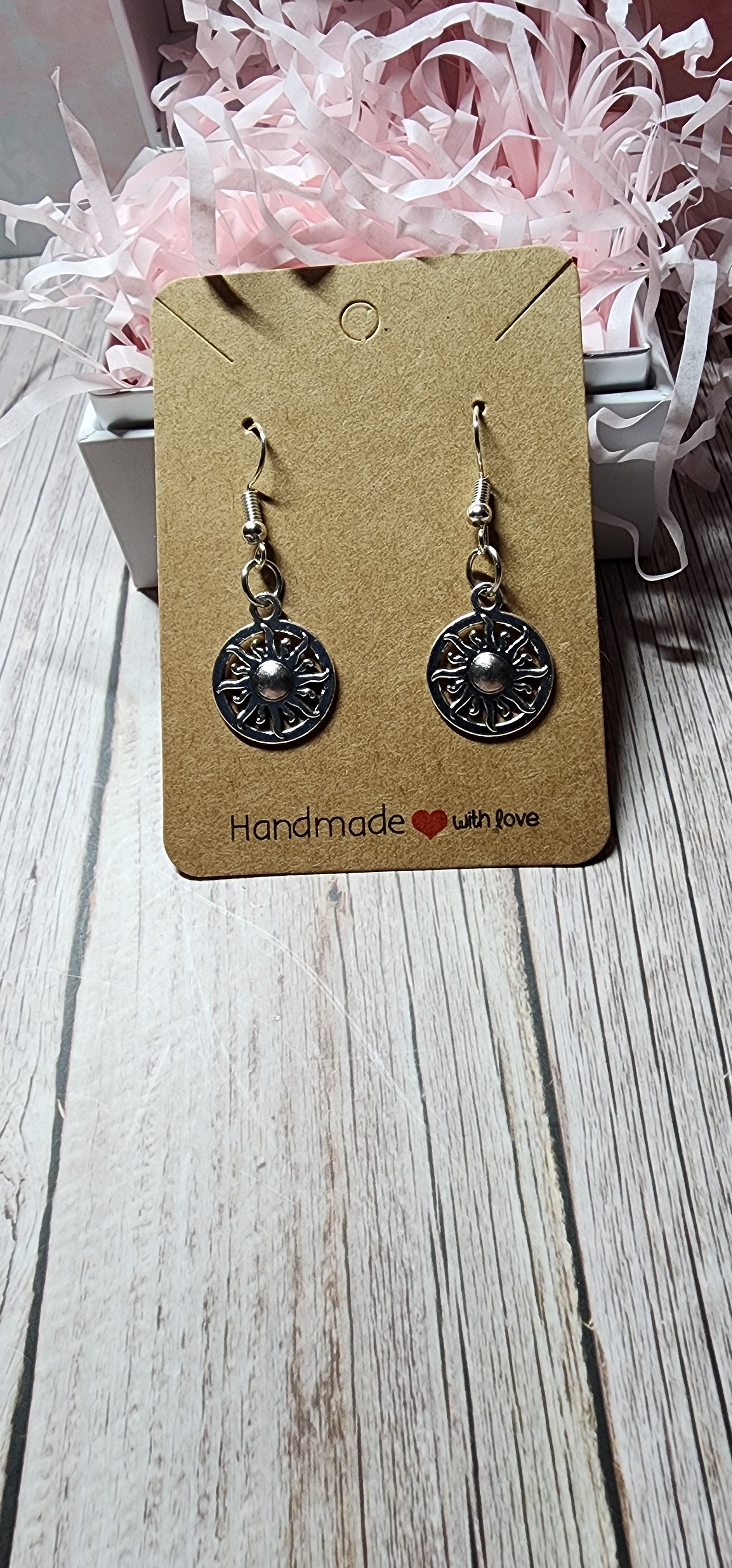 Boho style silver celestial dangle earrings sun moon and star charms