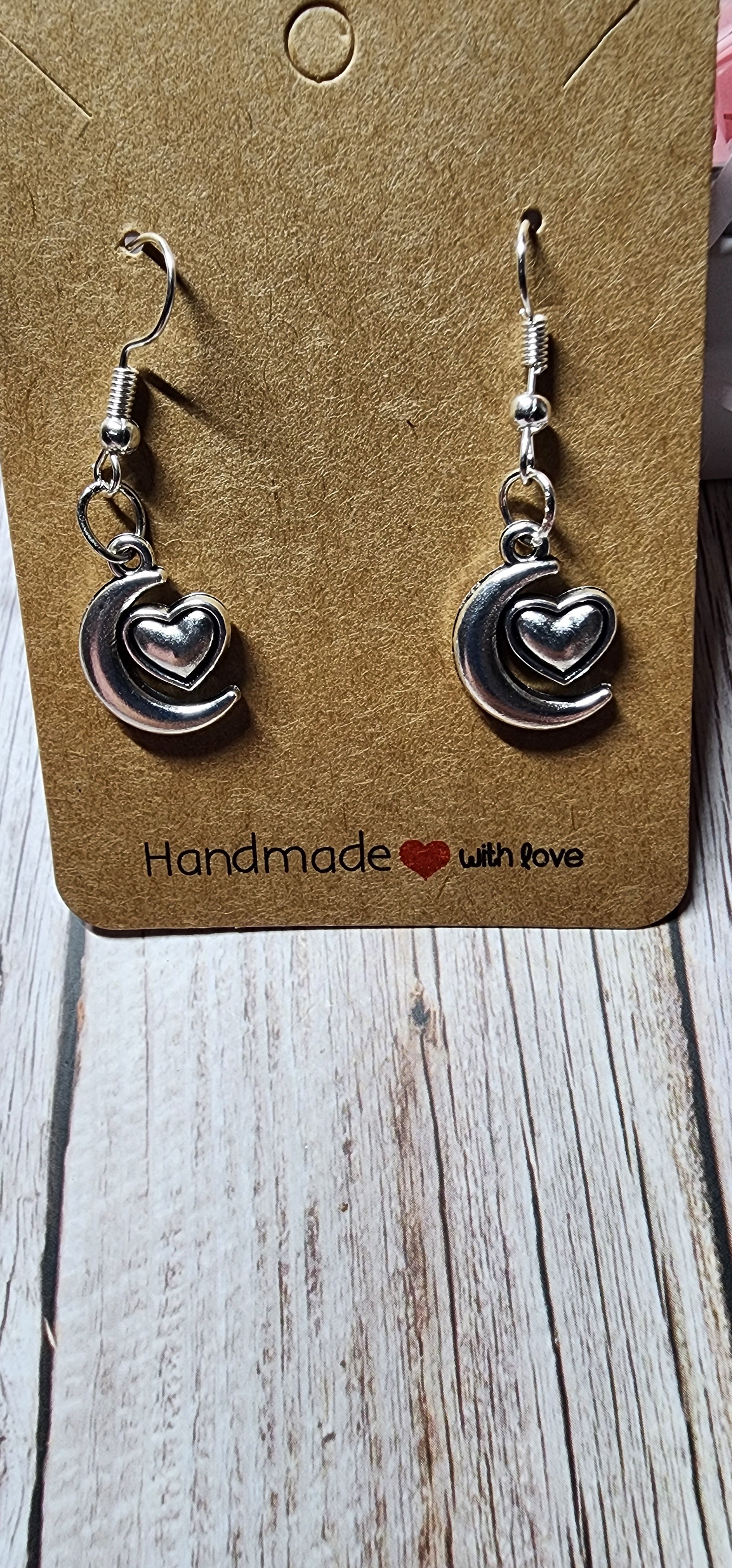 Boho style silver celestial dangle earrings sun moon and star charms