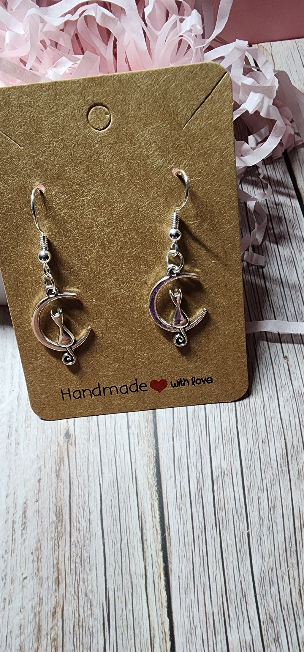 Boho style silver celestial dangle earrings sun moon and star charms