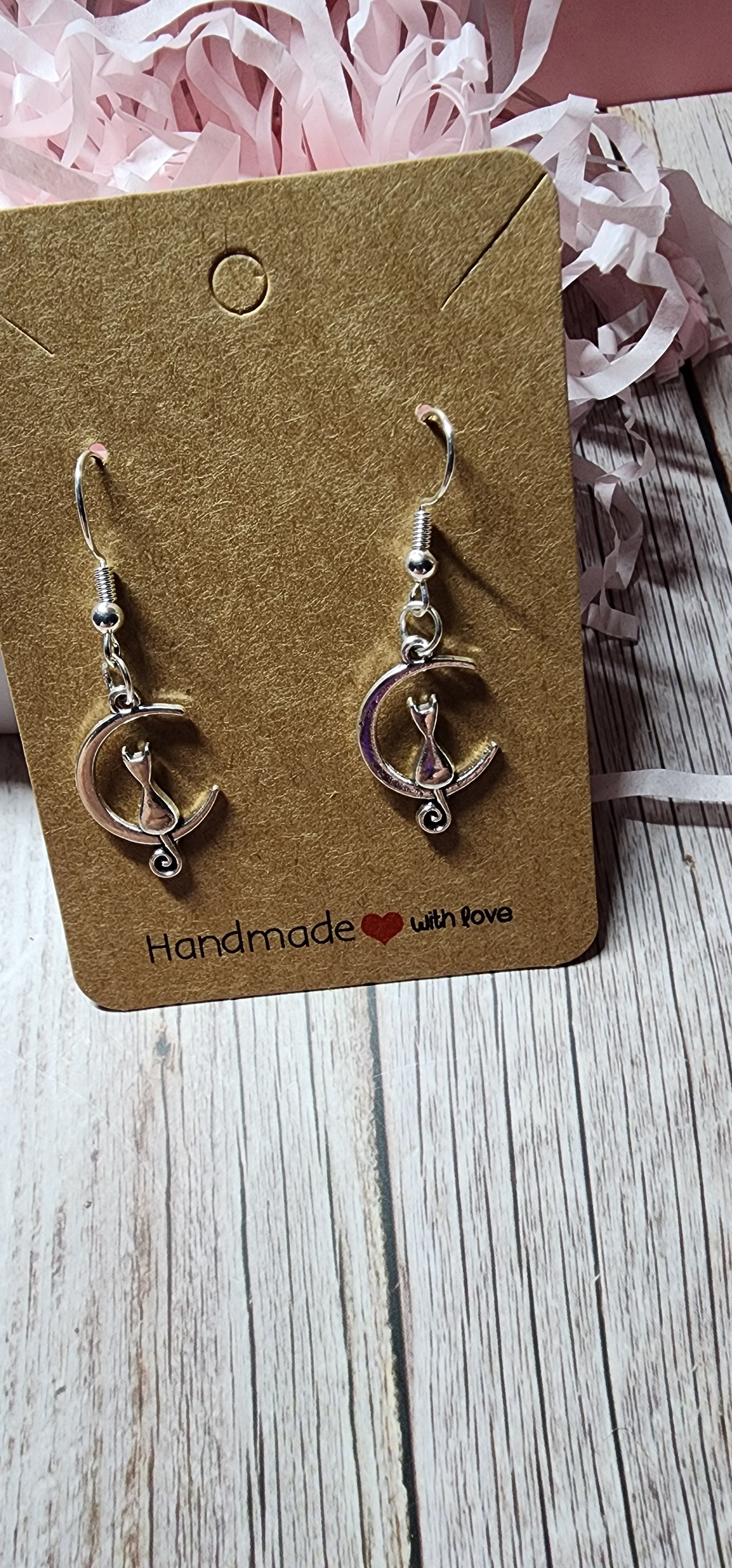 Boho style silver celestial dangle earrings sun moon and star charms