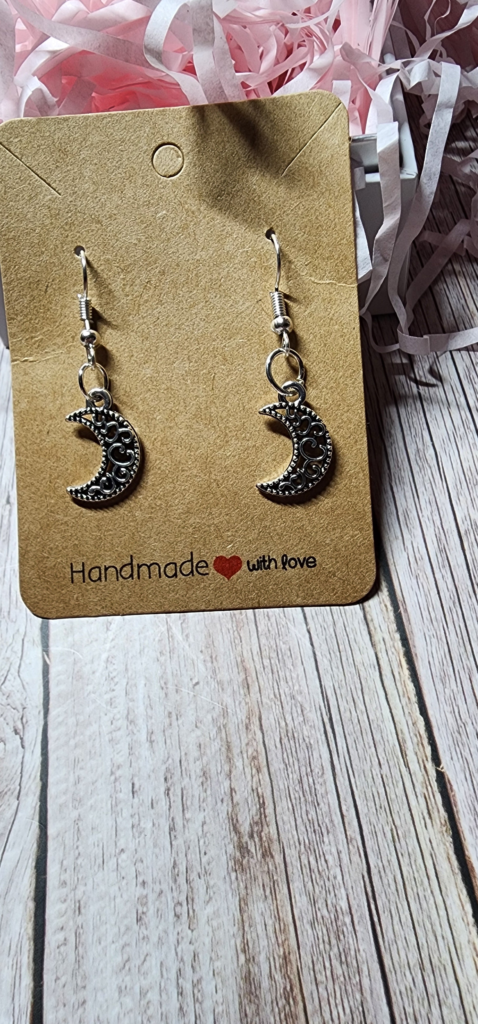 Boho style silver celestial dangle earrings sun moon and star charms