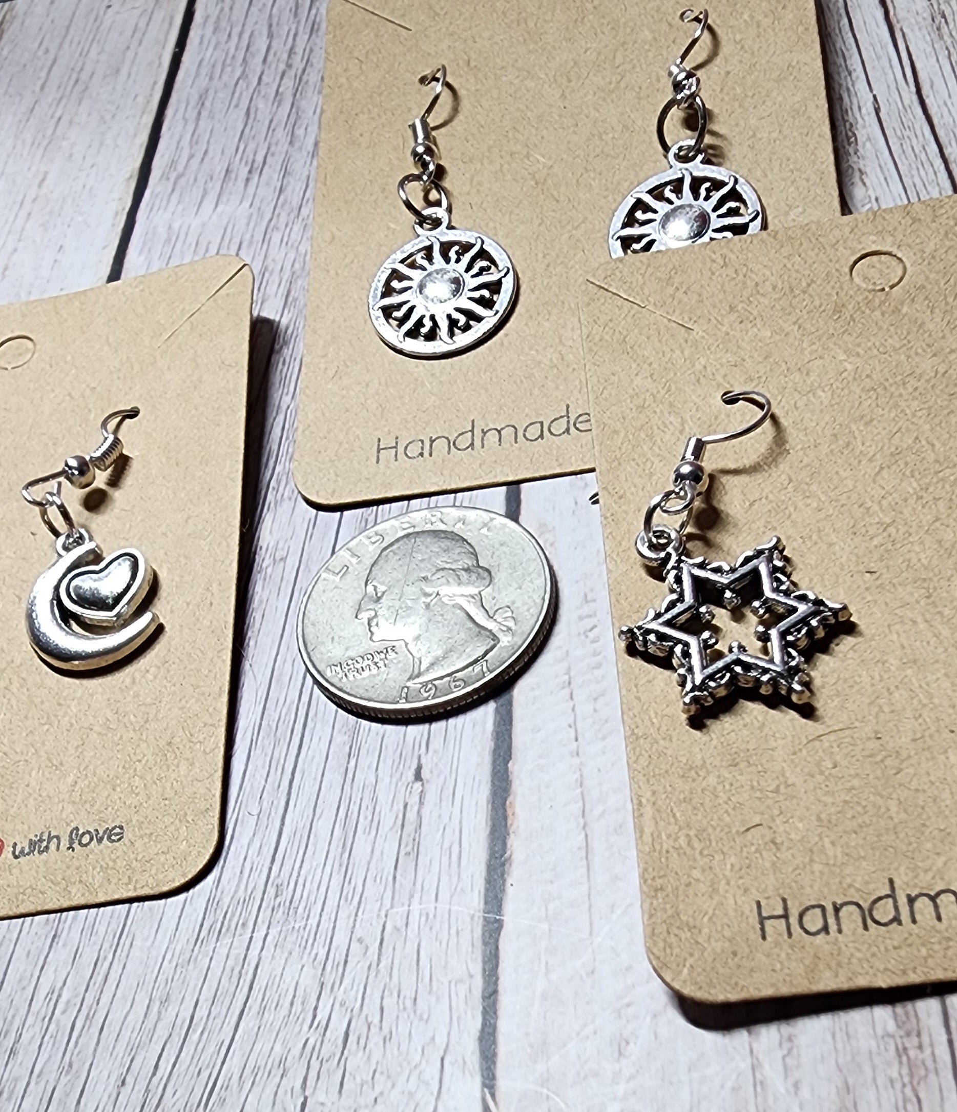 Boho style silver celestial dangle earrings sun moon and star charms