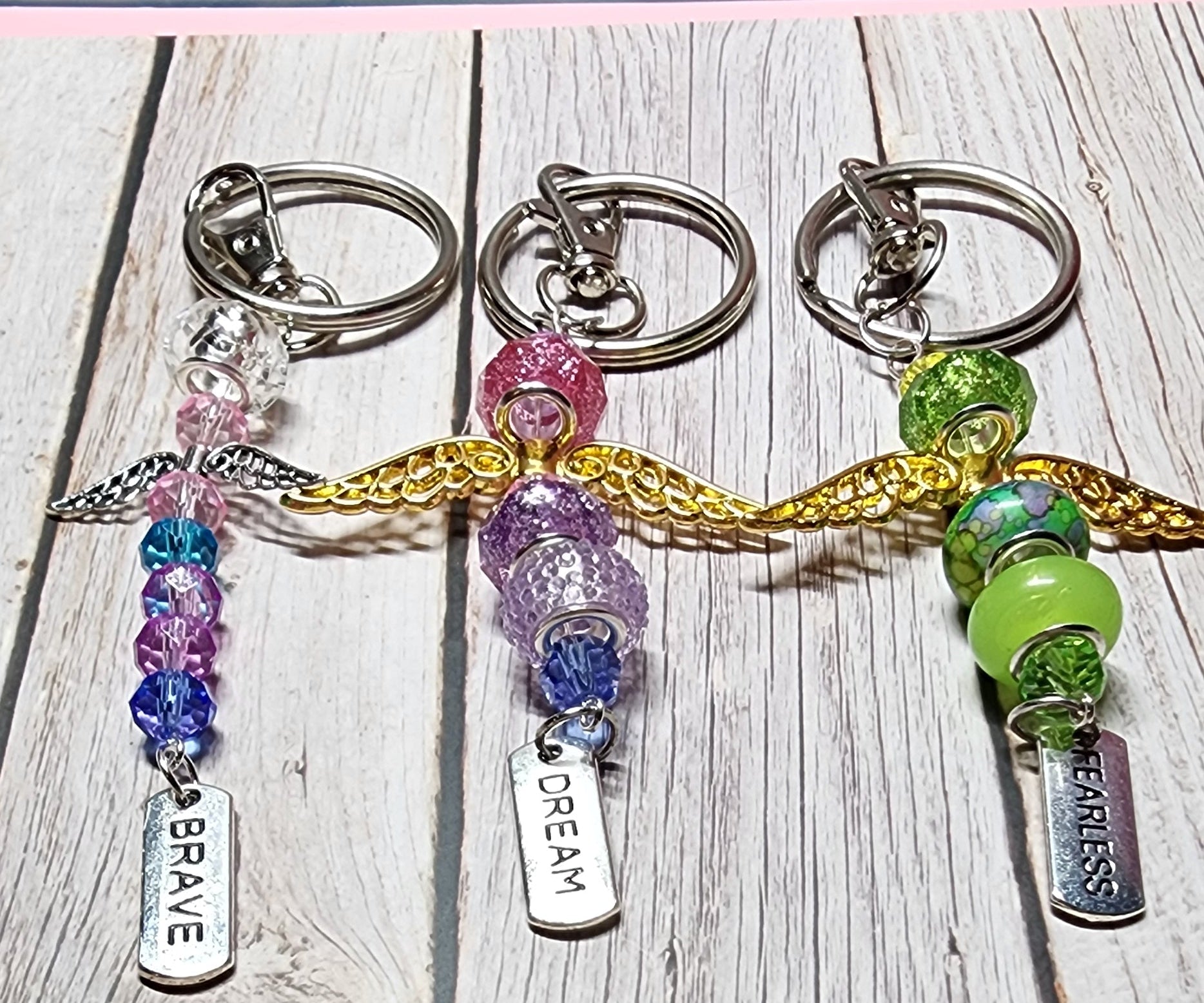 European glass beaded keychain, angel wings, sloth, turtle, sunflower charms, inspiration charm.