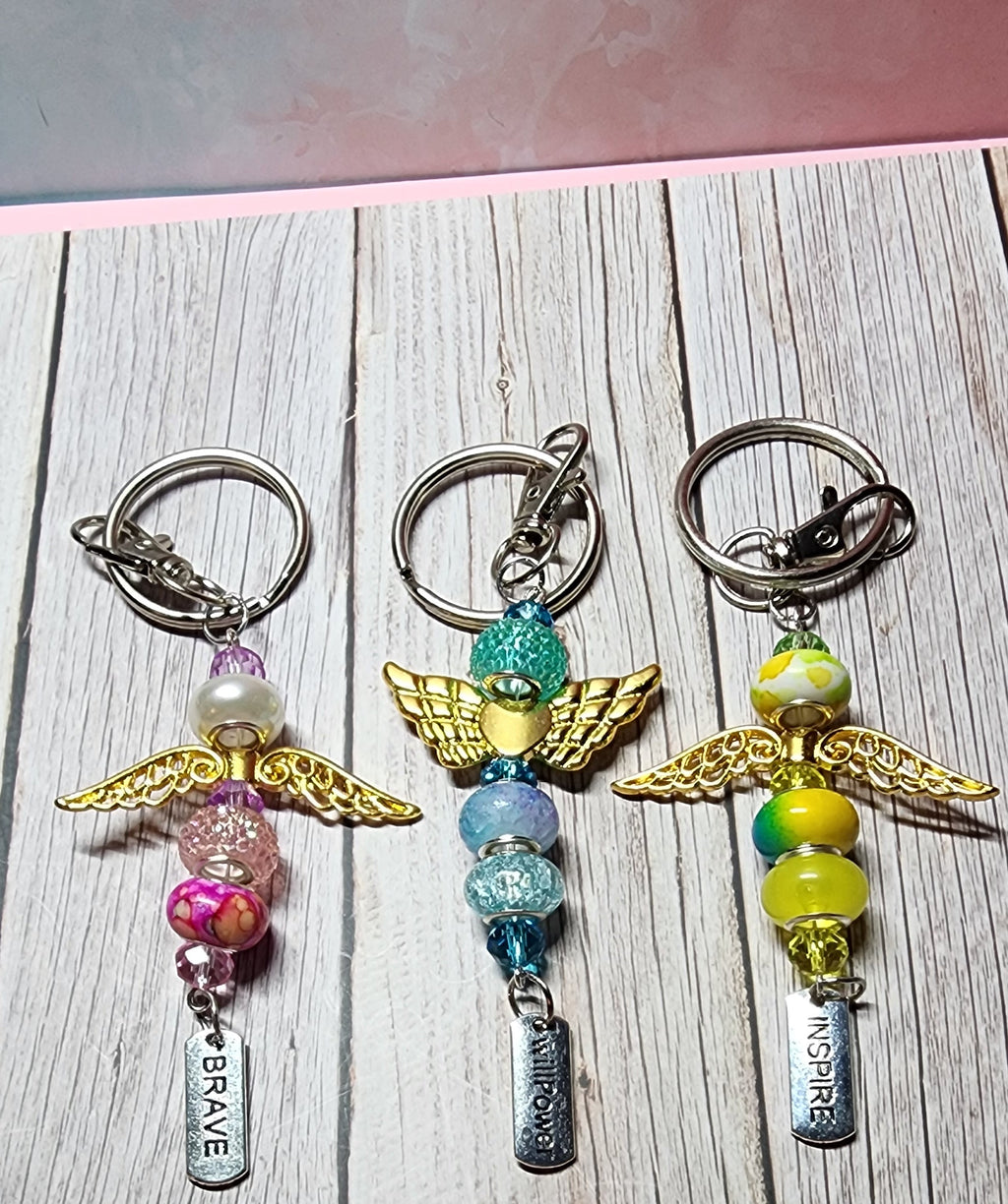 European glass beaded keychain, angel wings, sloth, turtle, sunflower charms, inspiration charm.