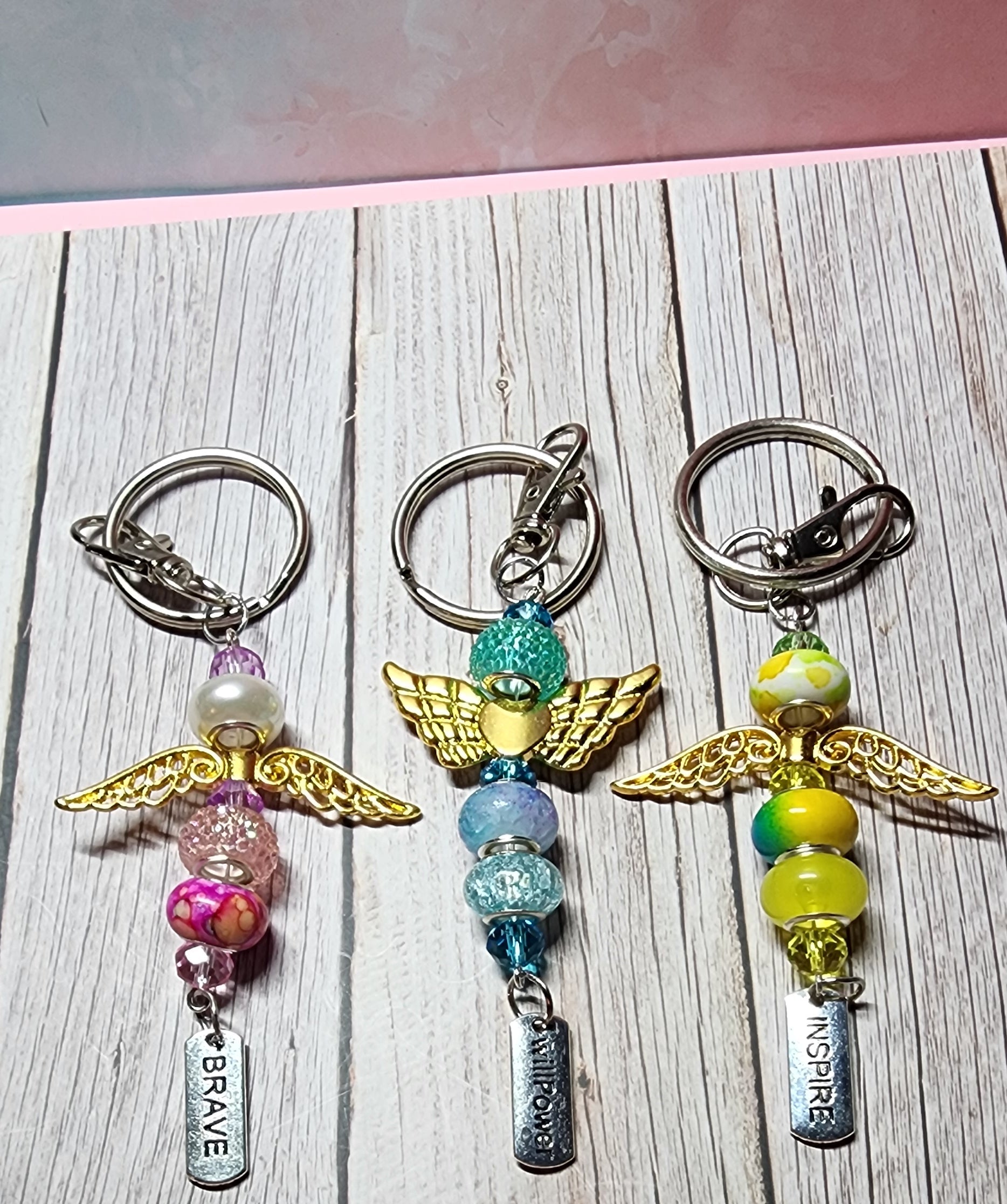 European glass beaded keychain, angel wings, sloth, turtle, sunflower charms, inspiration charm.