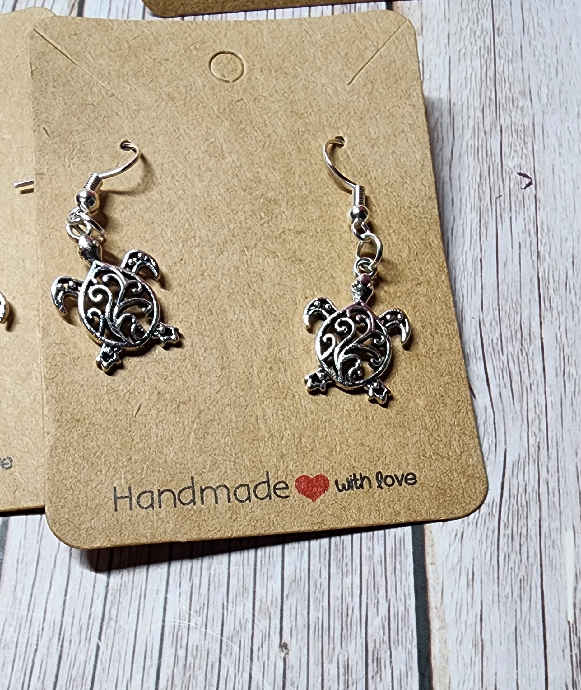 Whimsical Silver-Colored  Earrings sloth, turtle, hedgehog, elephant charms. Hypoallergenic Ear wires. Dangle earrings