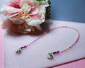Colorful glass seed bead bookmark with silver-colored charms
