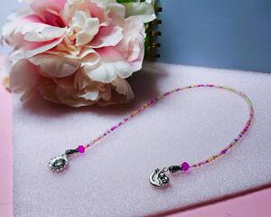 Colorful glass seed bead bookmark with silver-colored charms
