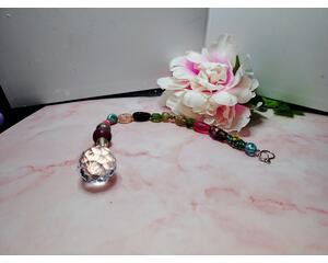 Handmade beaded suncatcher with colorful glass beads and a 30mm crystal prism ball