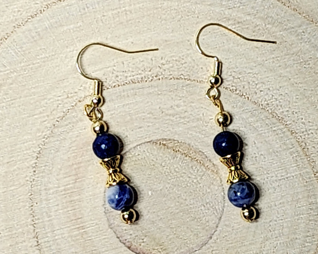 Dainty gemstone dangle earrings with dual sided gold tone bead caps