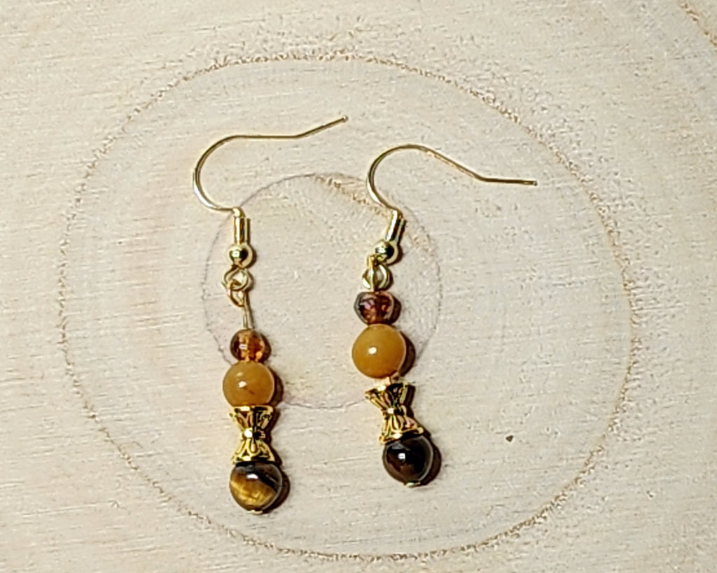 Dainty gemstone dangle earrings with dual sided gold tone bead caps