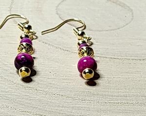 Dainty gemstone dangle earrings with dual sided gold tone bead caps
