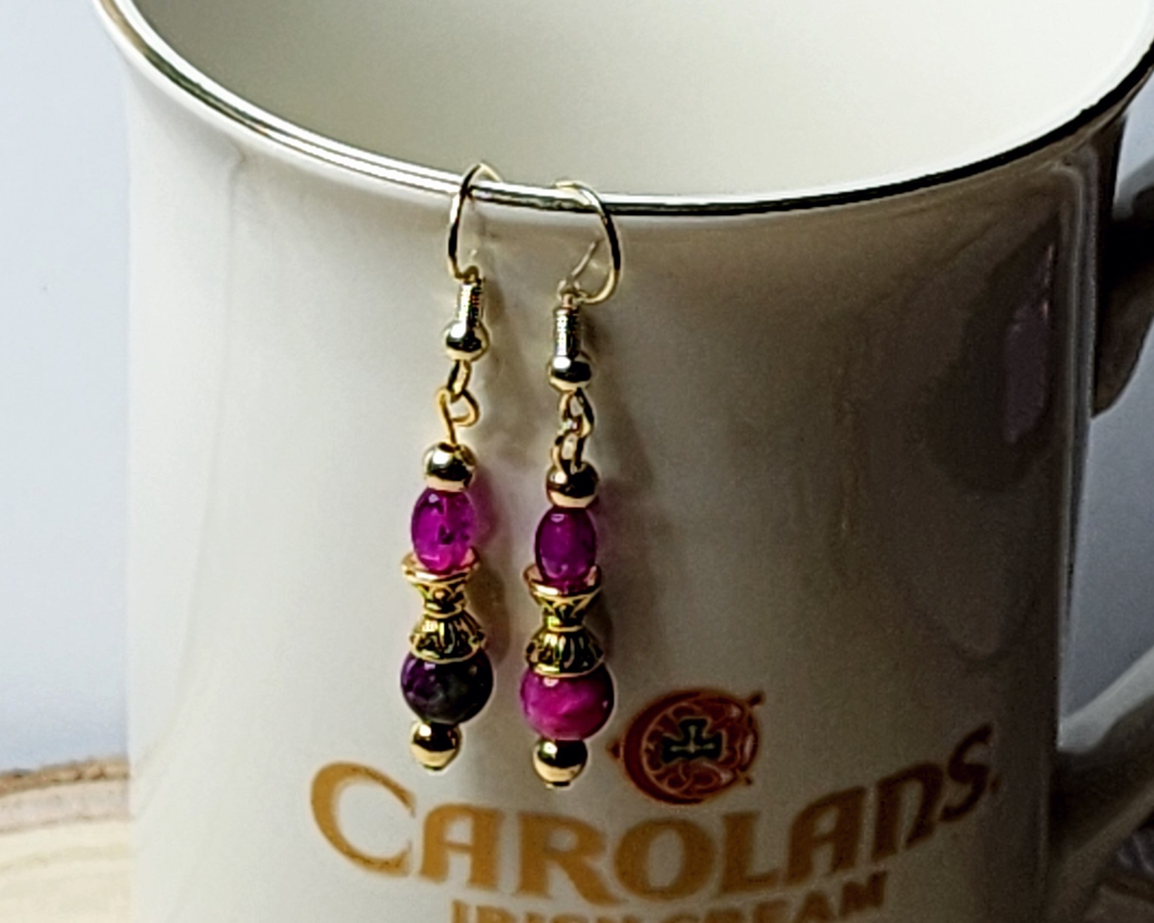 Dainty gemstone dangle earrings with dual sided gold tone bead caps