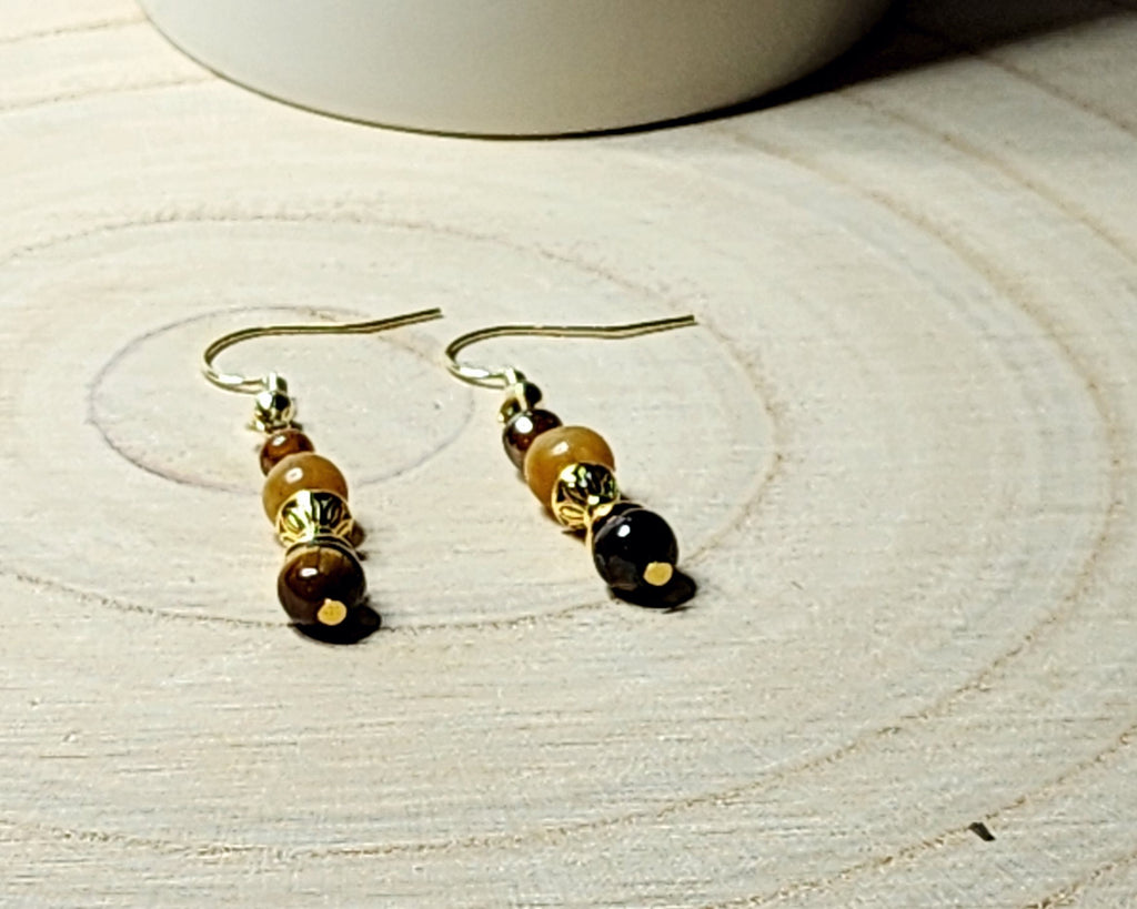 Dainty gemstone dangle earrings with dual sided gold tone bead caps