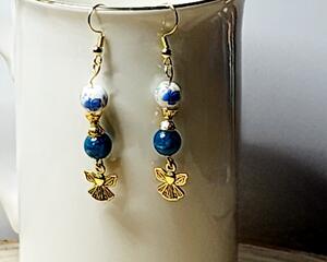 Handmade porcelain dangle earrings with blue floral design