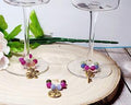 Wine glass markers with glass and gemstone beads and various themes of charms