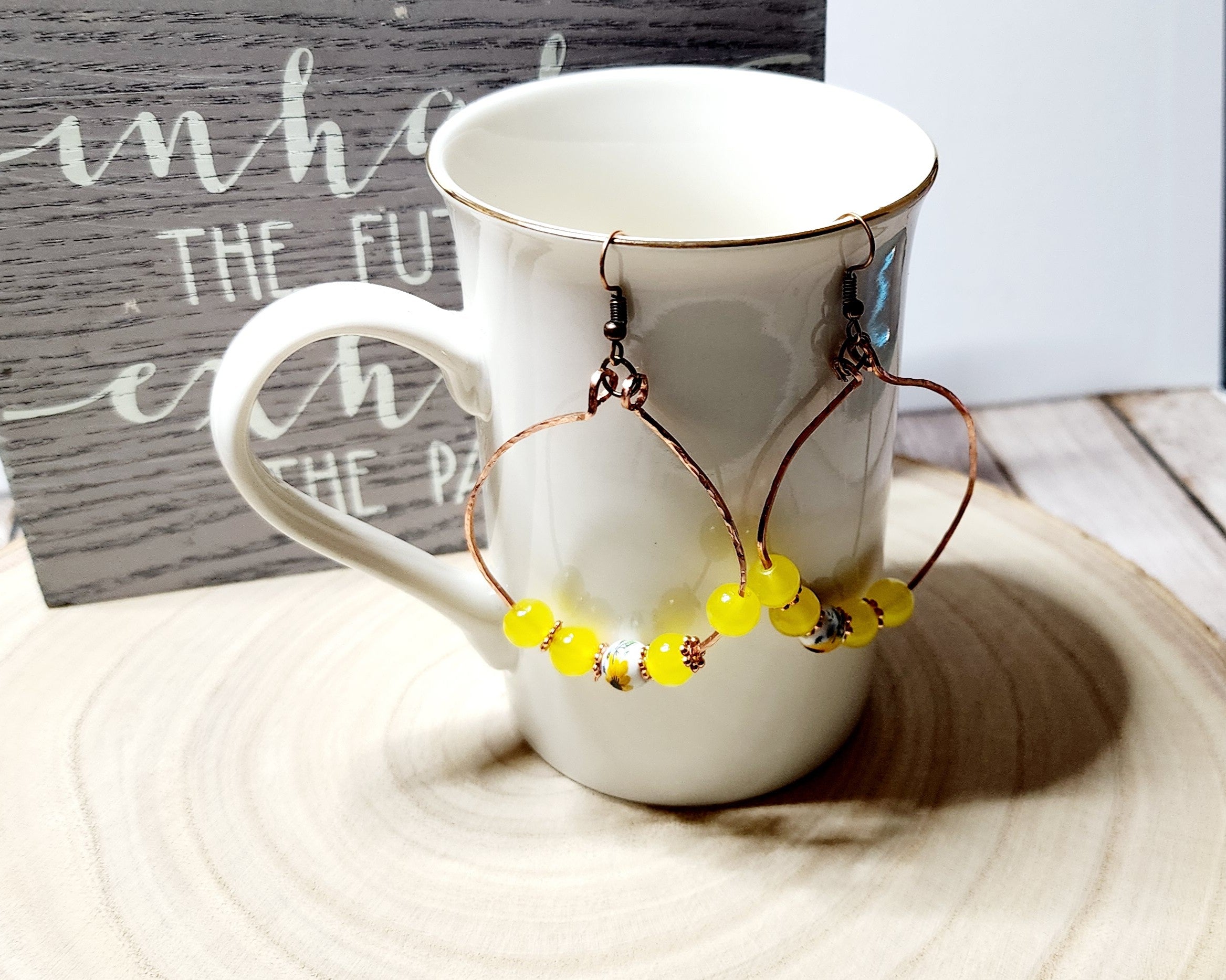 Handcrafted spring themed copper hoop earrings