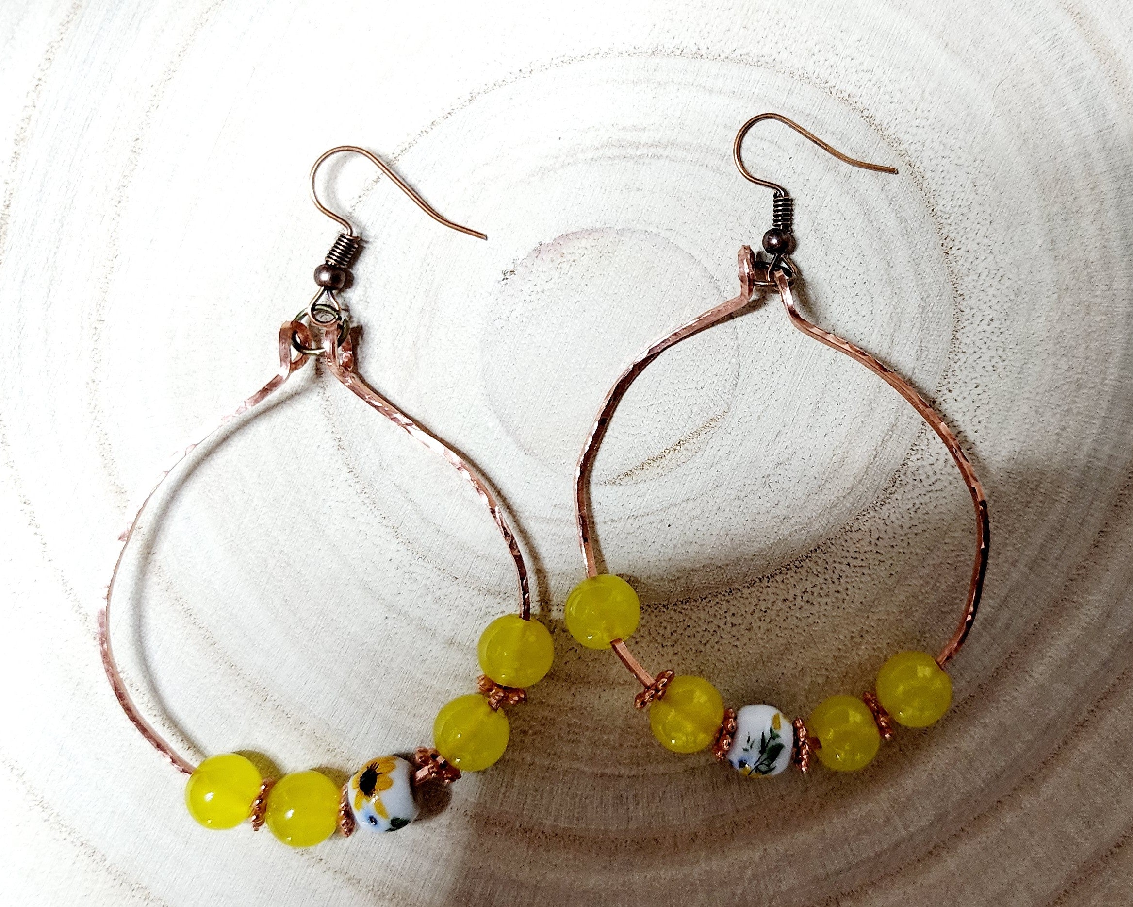 Handcrafted spring themed copper hoop earrings