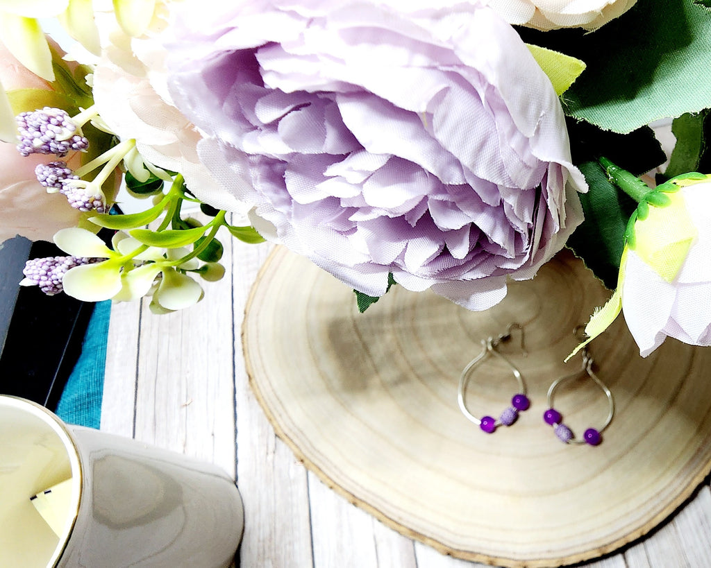 Handcrafted spring themed copper hoop earrings