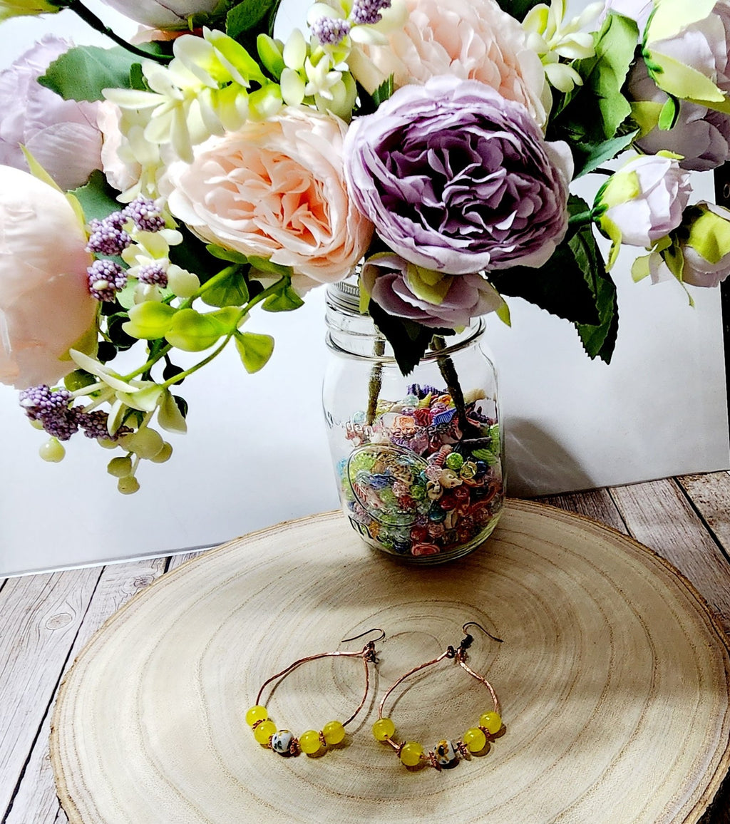 Handcrafted spring themed copper hoop earrings