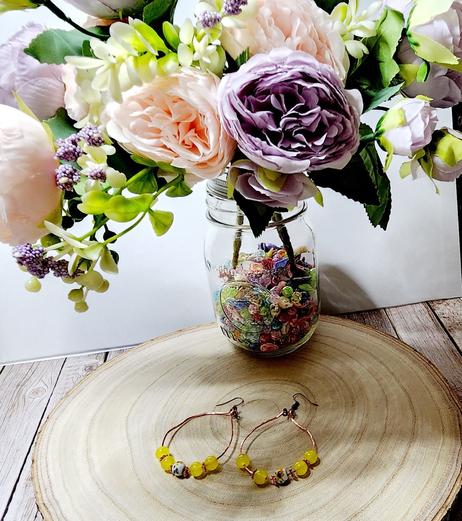 Handcrafted spring themed copper hoop earrings