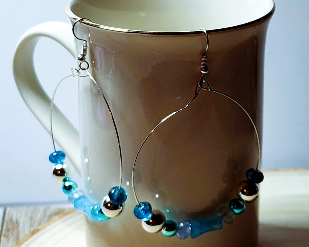 Stunning Memory Wire Hoop earrings with Mermaid glass or Hematite beads, silver accents