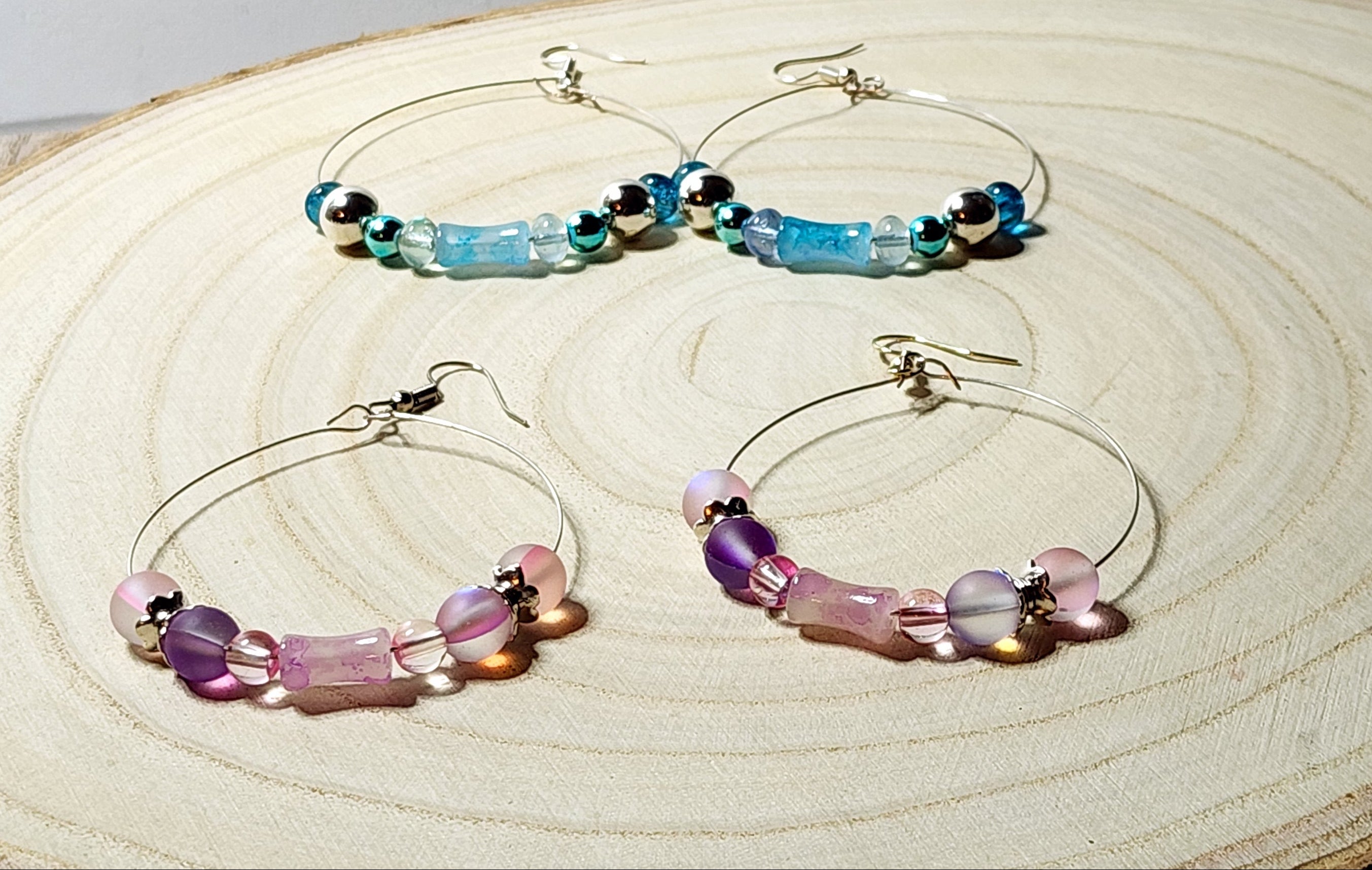 Stunning Memory Wire Hoop earrings with Mermaid glass or Hematite beads, silver accents