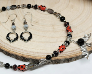 Bat Necklace with Lamp work Beads & Round Bat Wing Earrings