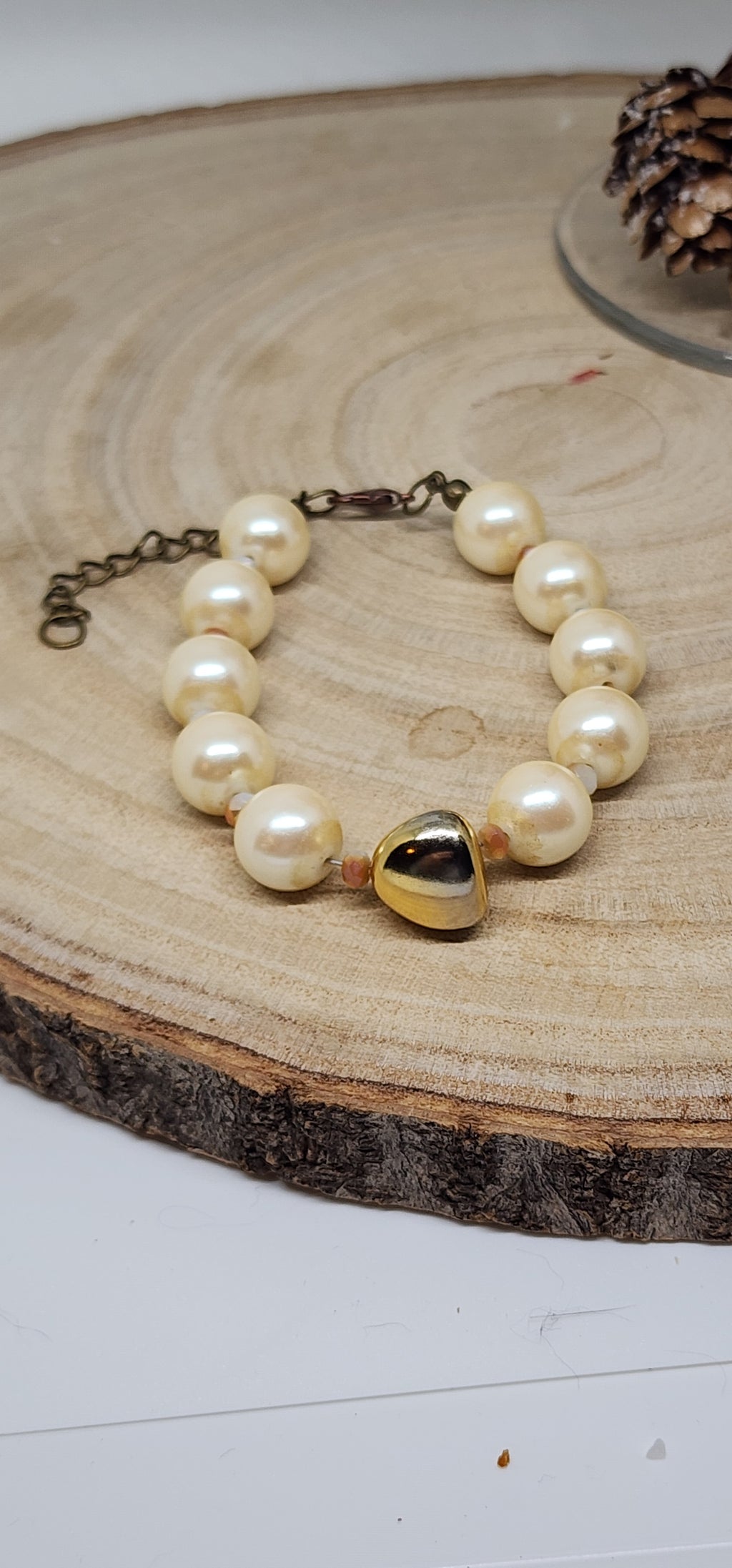 Faux Pearl Cream Colored Beads  And Gold Colored Glass Accent Bead