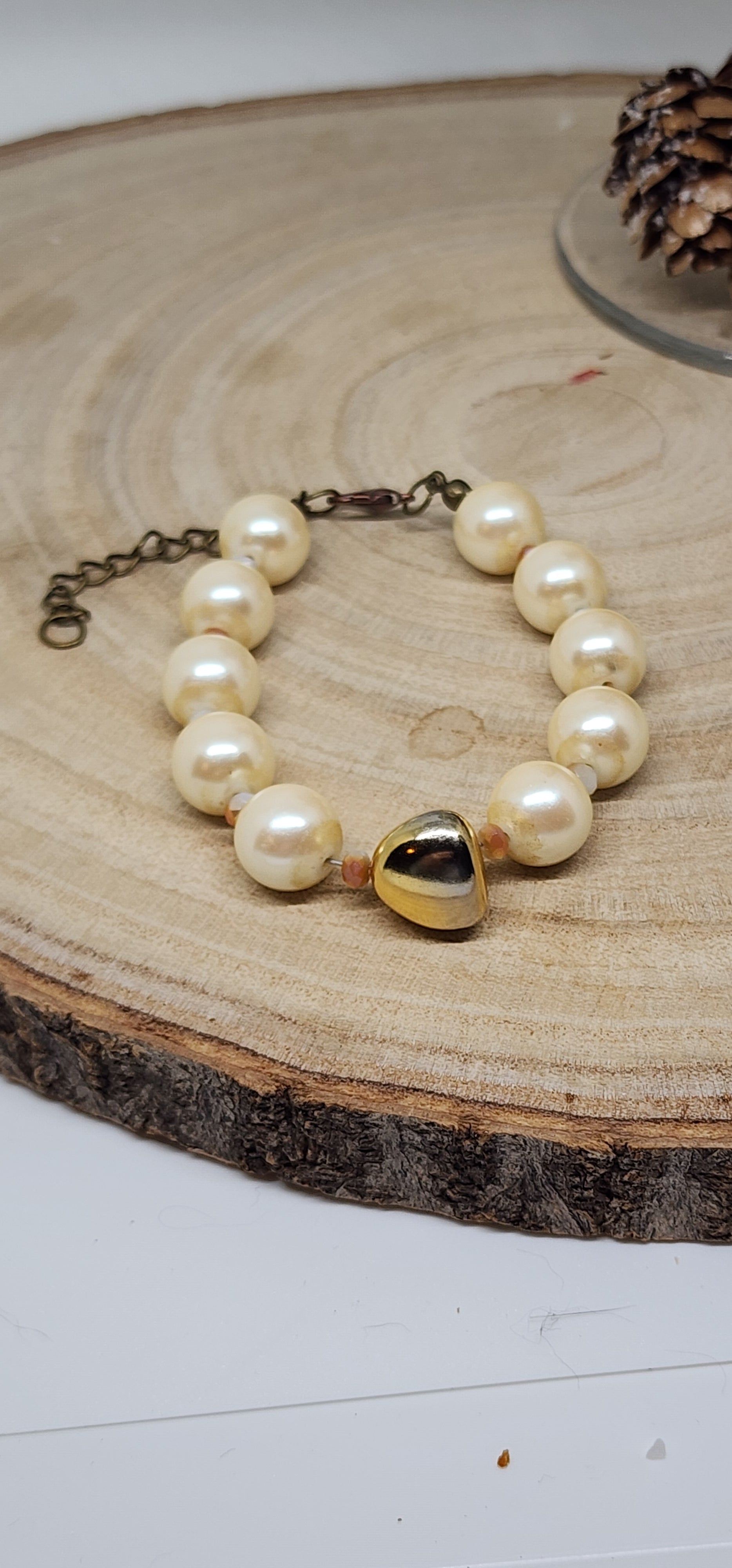 Faux Pearl Cream Colored Beads  And Gold Colored Glass Accent Bead