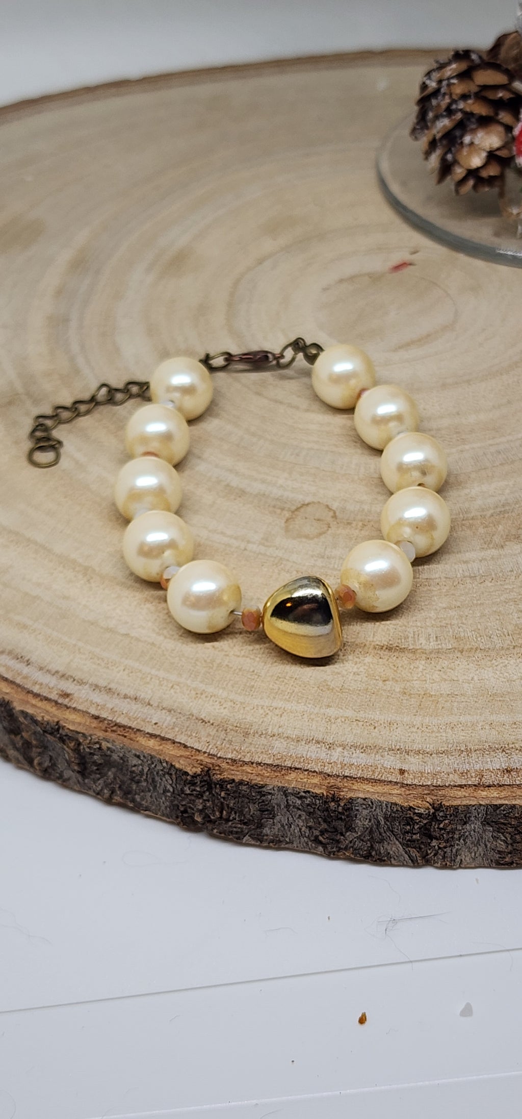Faux Pearl Cream Colored Beads  And Gold Colored Glass Accent Bead