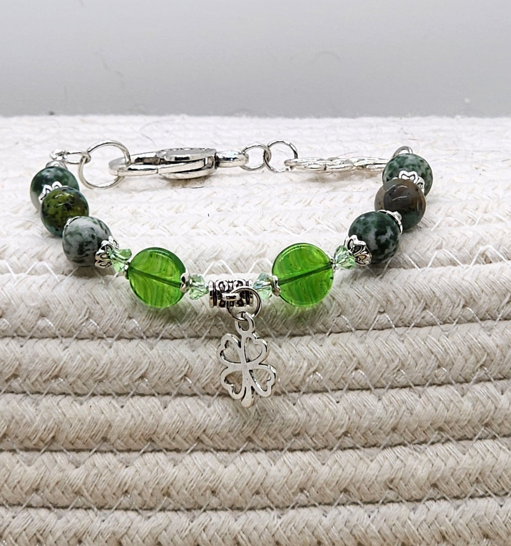 St. Patrick's Day beaded gemstone bracelet with gold or silver tone accents and charm