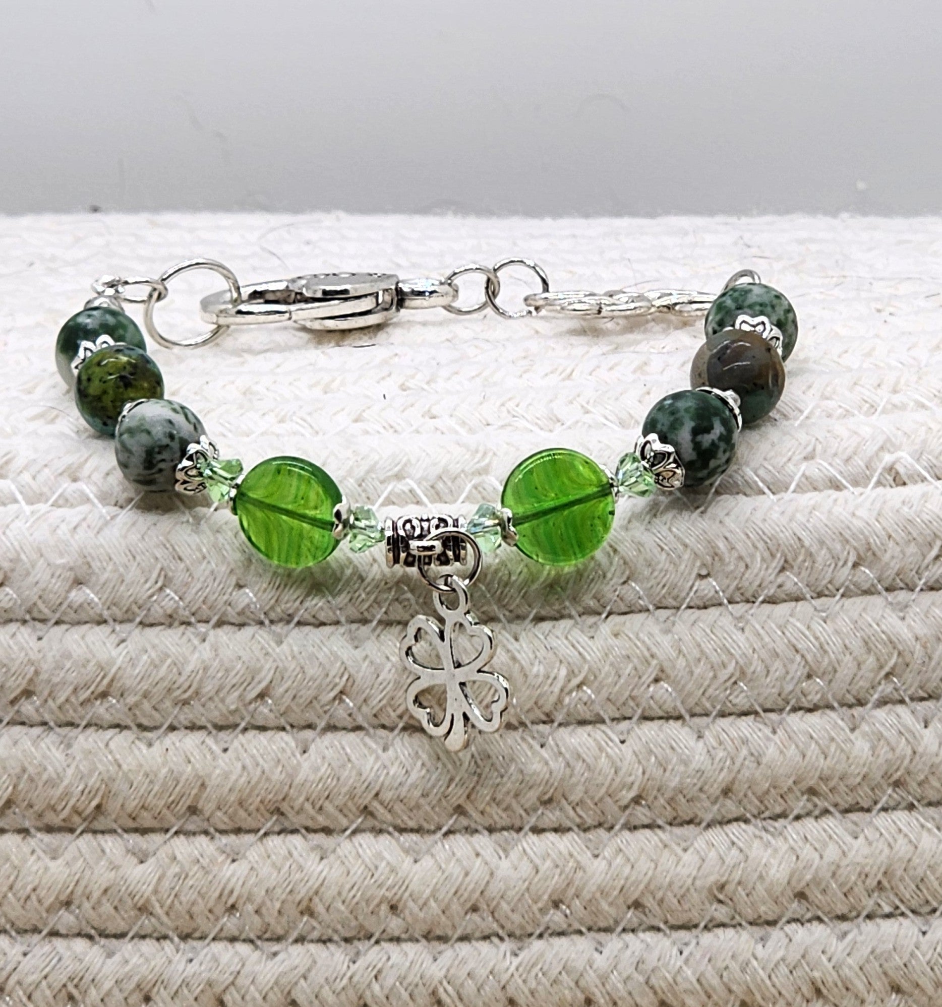 St. Patrick's Day beaded gemstone bracelet with gold or silver tone accents and charm