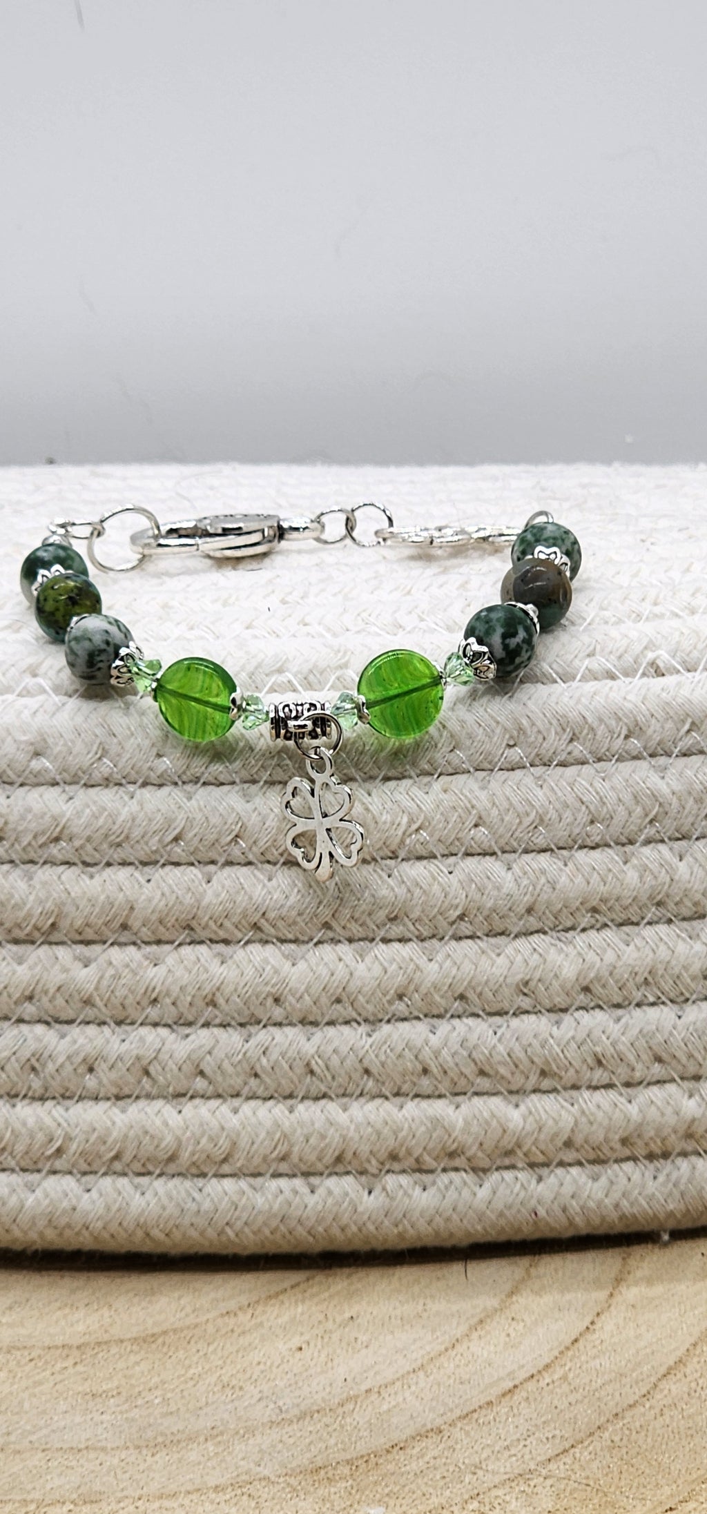 St. Patrick's Day beaded gemstone bracelet with gold or silver tone accents and charm