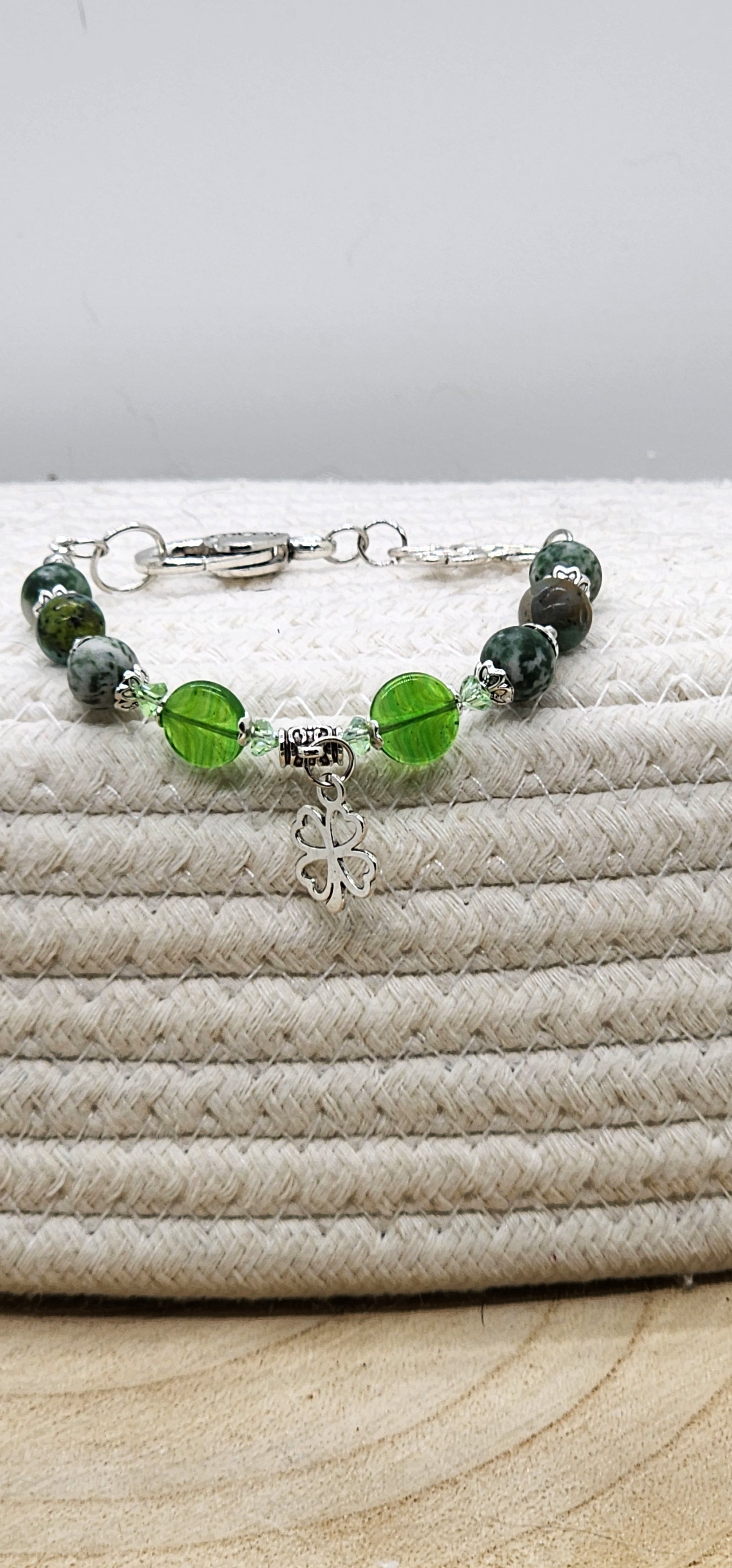 St. Patrick's Day beaded gemstone bracelet with gold or silver tone accents and charm