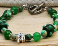 Green glass and gemstone beaded St. Patrick's Day bracelet with silver accents