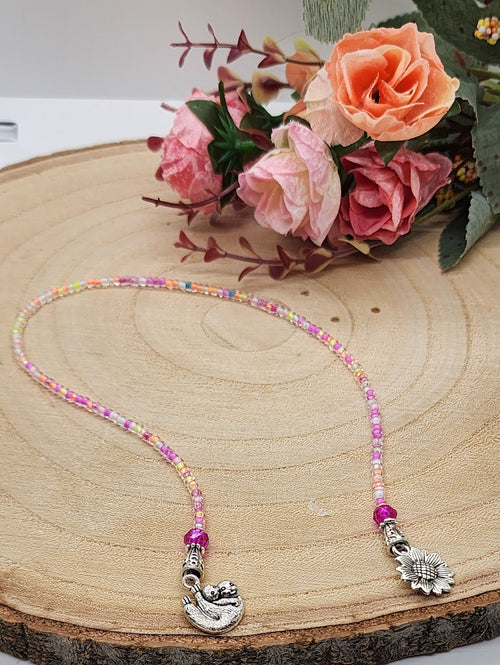 Colorful glass seed bead bookmark with silver-colored charms