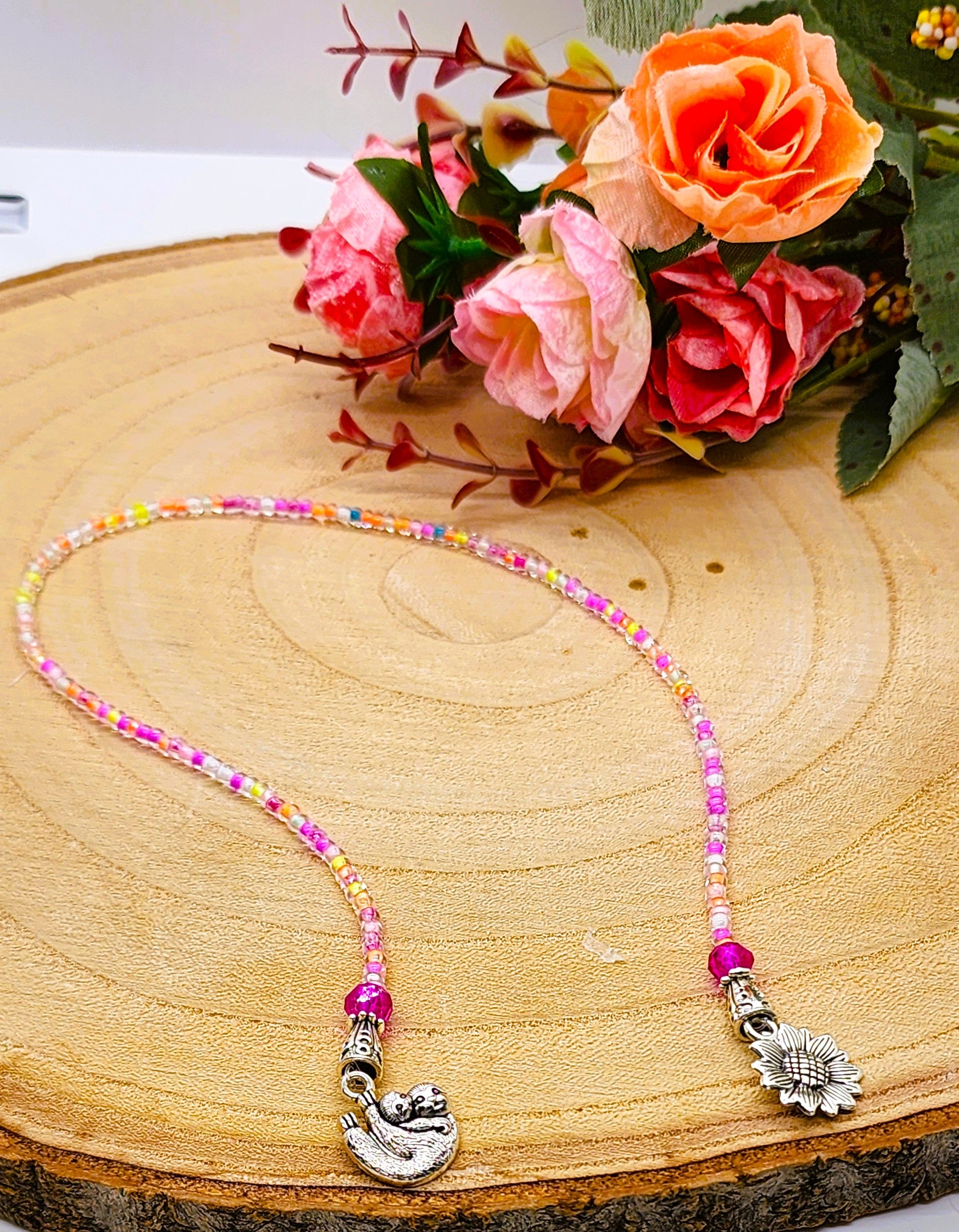 Colorful glass seed bead bookmark with silver-colored charms