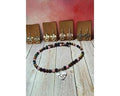 Enchanting Dragon Natural Stone necklace and earring set with silver-colored accents and charm