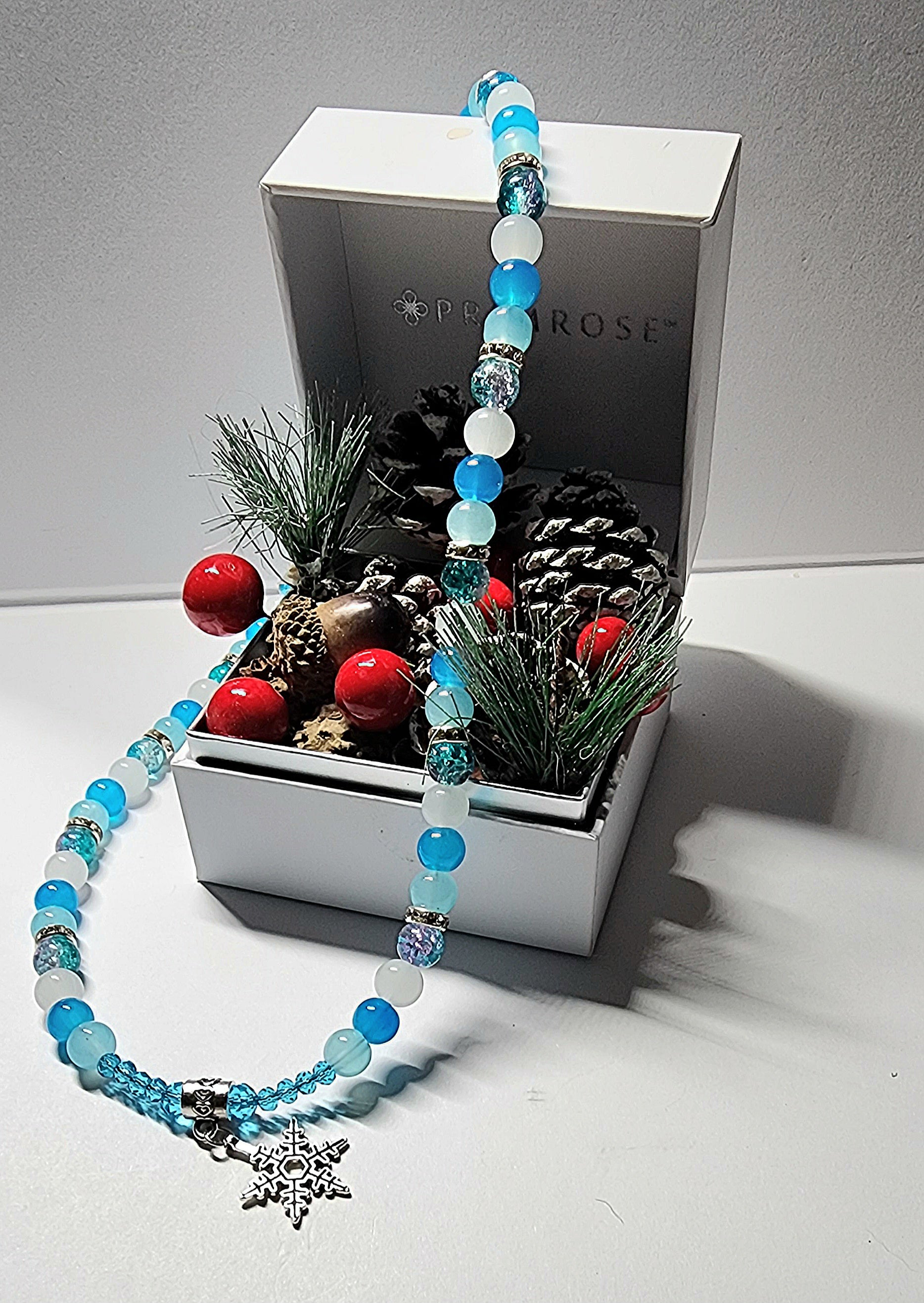 Silver winter themed blue and white glass beaded necklace with silver and rhinestone spacer beads. Christmas gift, holiday accessory.