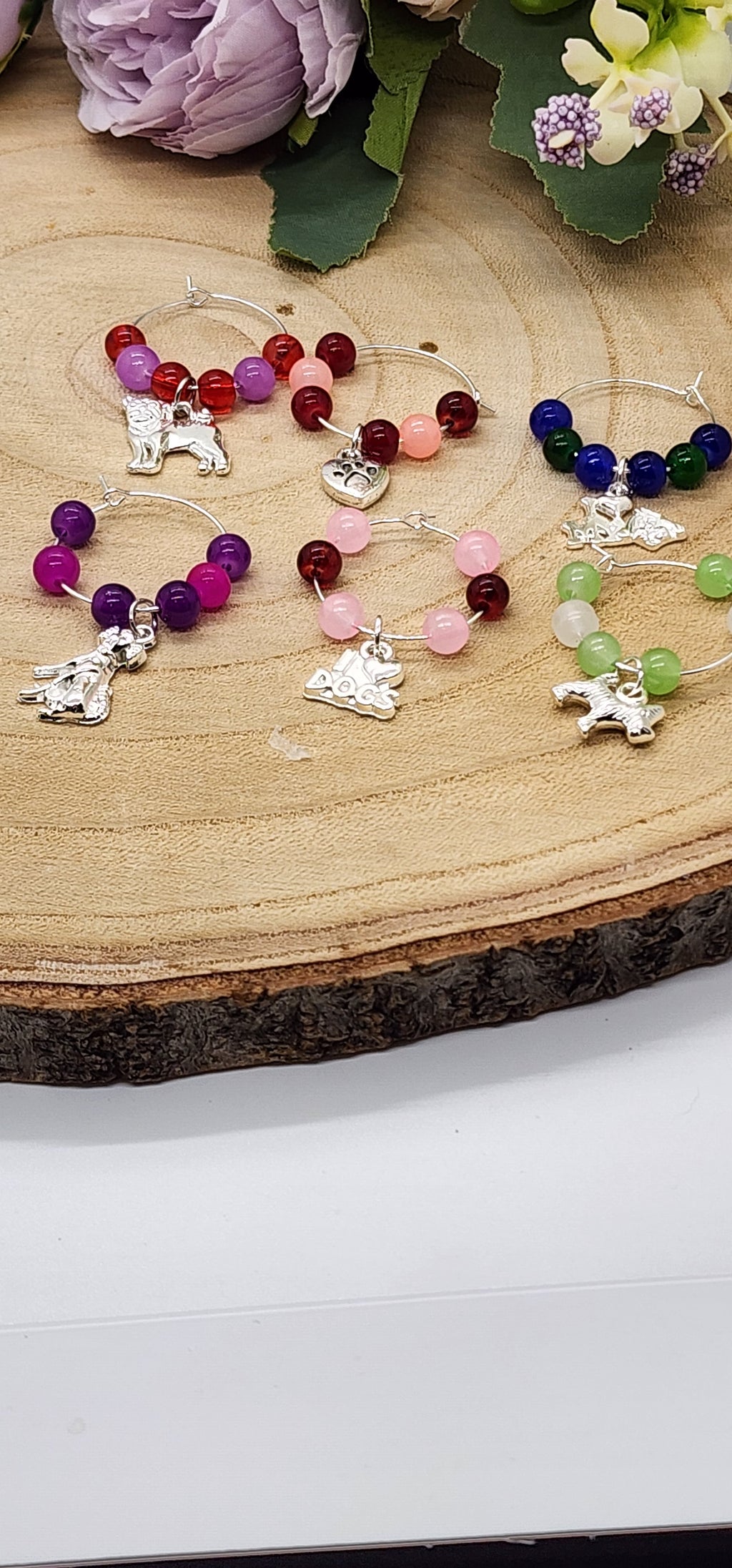 Wine glass markers with glass and gemstone beads and various themes of charms