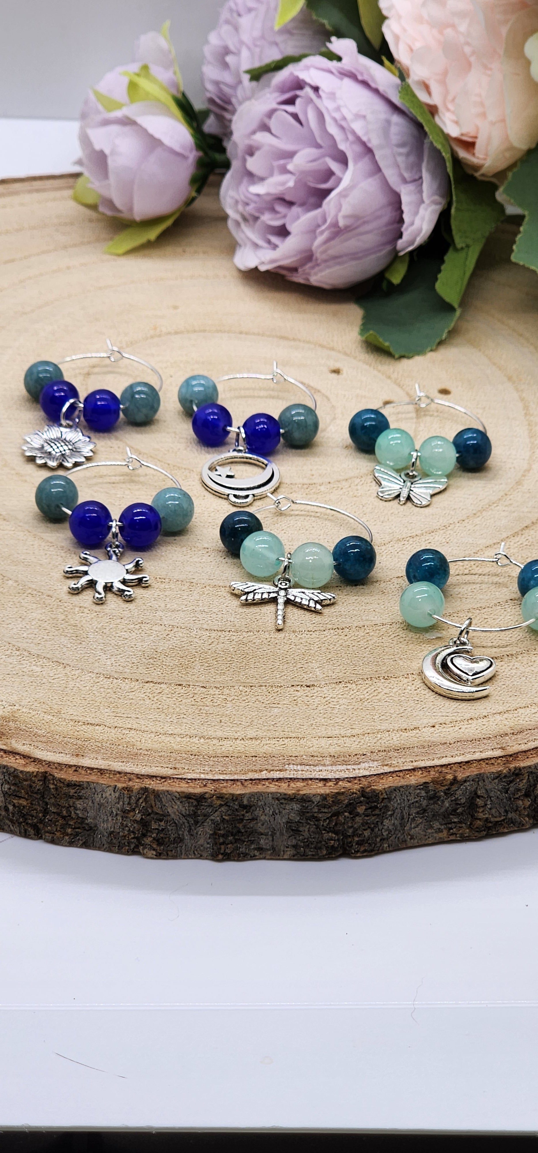 Wine glass markers with glass and gemstone beads and various themes of charms