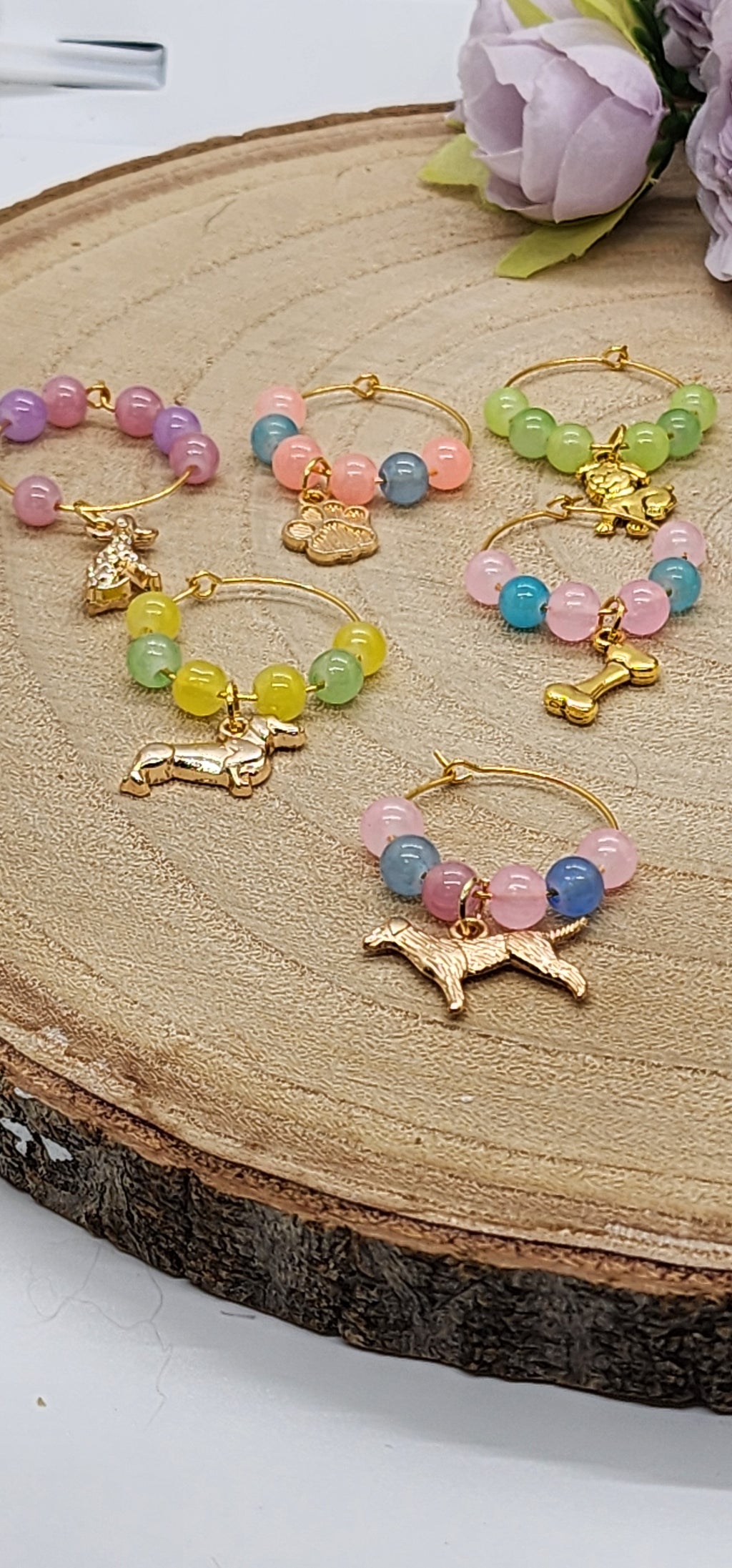 Wine glass markers with glass and gemstone beads and various themes of charms