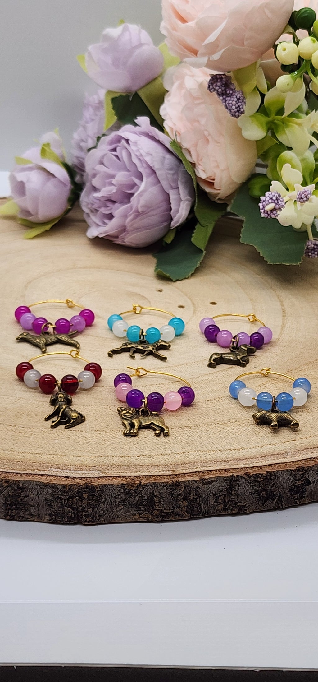 Wine glass markers with glass and gemstone beads and various themes of charms