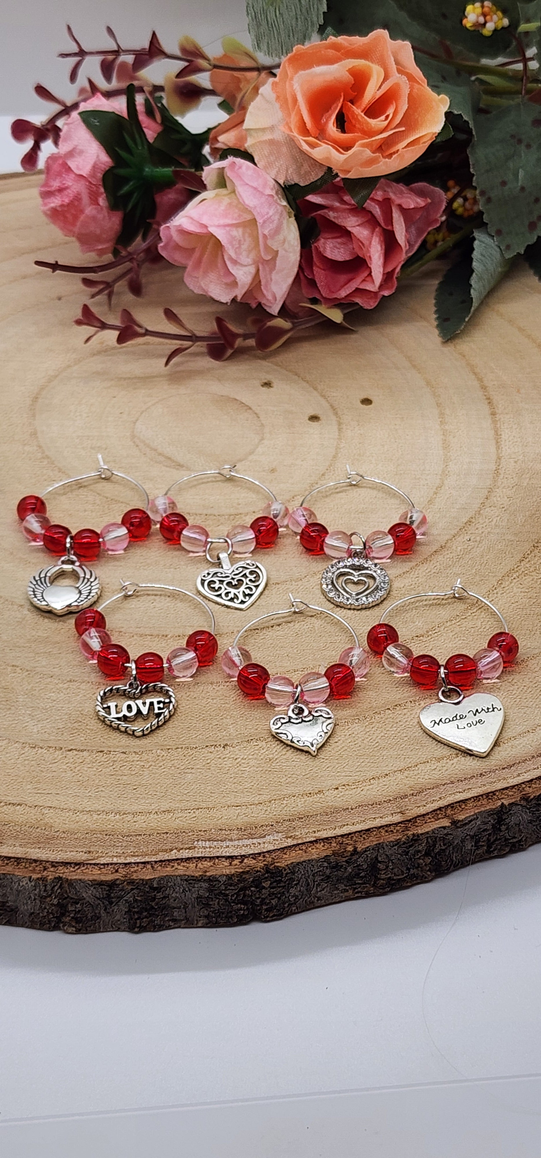 Wine glass markers with glass and gemstone beads and various themes of charms