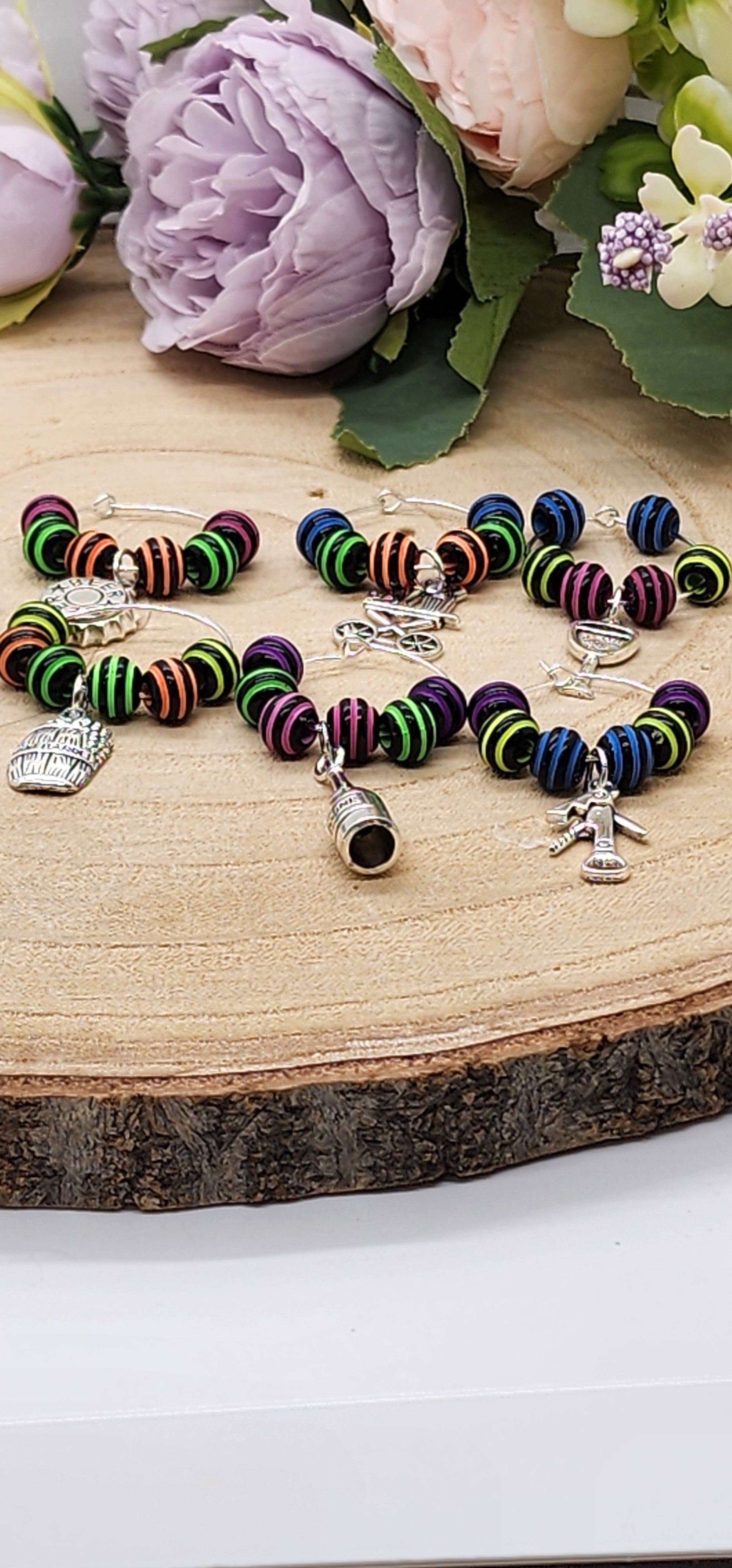 Wine glass markers with glass and gemstone beads and various themes of charms