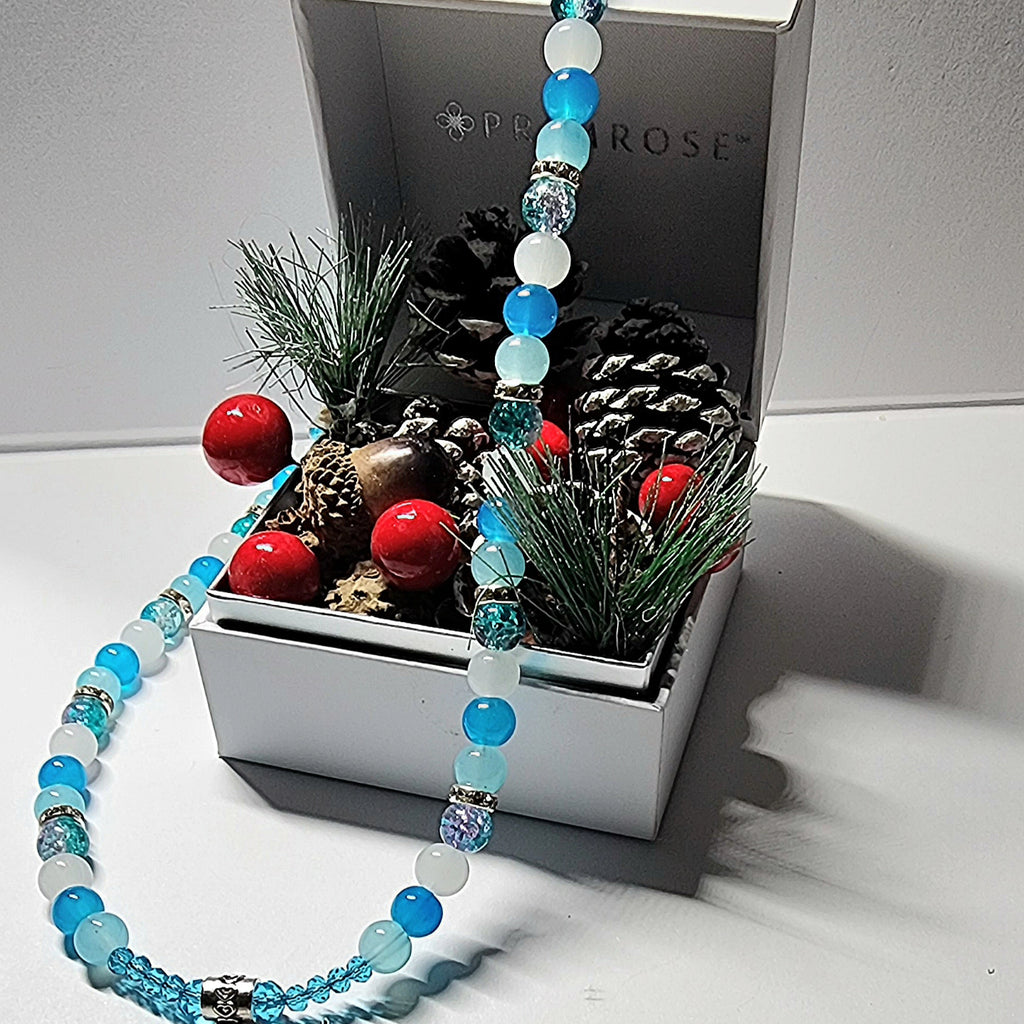 Silver winter themed blue and white glass beaded necklace with silver and rhinestone spacer beads. Christmas gift, holiday accessory.