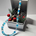 Silver winter themed blue and white glass beaded necklace with silver and rhinestone spacer beads. Christmas gift, holiday accessory.