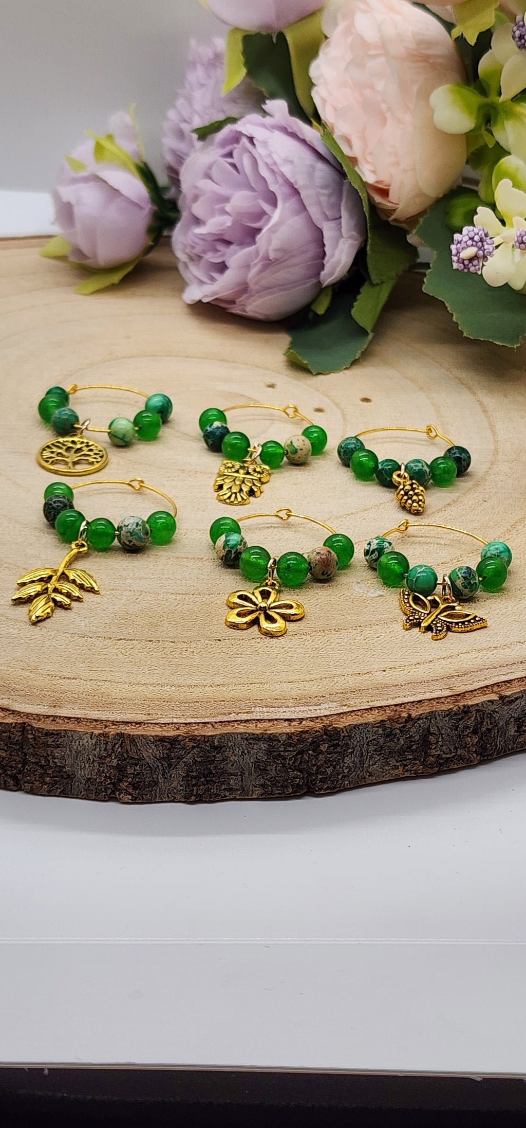Wine glass markers with glass and gemstone beads and various themes of charms